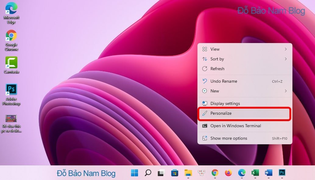 Bước 1: Click chuột phải ở desktop, chọn Personalize